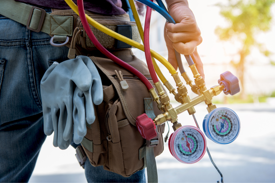 picture of an air conditioning maintenance man